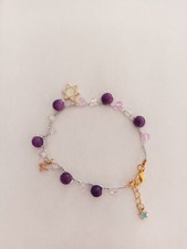 Braccialetto con ciondoli, all'uncinetto con cristalli viola e bianco