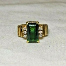 Splendido Anello anni ' 70 in oro giallo con brillanti 0,25 ct approx  e tormali