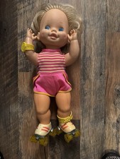 Lotto bambole pattini bambino