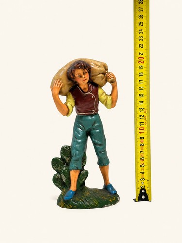 Portatore con sacco presepe