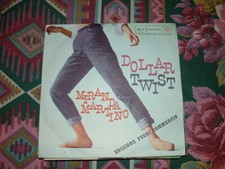 MIRANDA MARTINO " DOLLAR TWIST