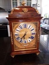 Orologio religioso in legno di