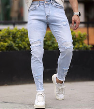 Jeans uomo slim strappati