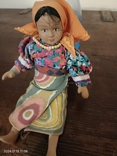 Bambola in ceramica da