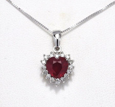 CIONDOLO DEL RUBINO CUORE CT.1,90 E DIAMANTI NATURALI IN ORO 18 KT CON CATENA