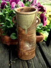 Antico vaso a doppio manico