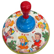 Trottola vintage anni 60 Ohio Arts per bambini in metallo Here We Go Round the Mulberry Bush