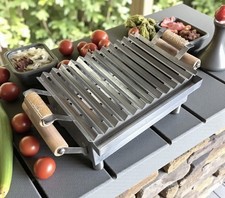 Griglia a forma di V carbone