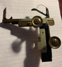 Antico microscopio meccanico