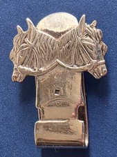 Raffinato fermasoldi in argento massiccio (18 gr.) con due cavalli