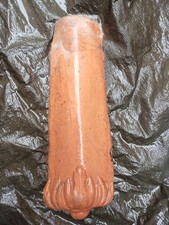 Coppo antico in terracotta  con finale decorato motivo floreale in rilievo