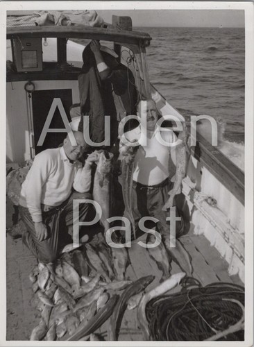 Men with fish catch boat - fish, on