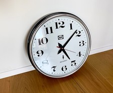 Orologio pubblicitario muro