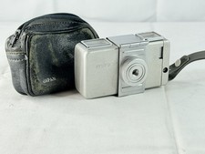 Minolta 16, con flashshoe e