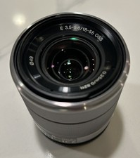 Sony E 18-55 mm F/3.5 - obiettivo 5.6 OSS (SEL1855) - argento + copriobiettivo anteriore e posteriore