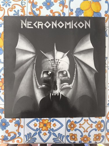 Necronomicon t self - -,