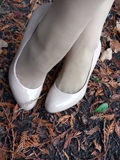 Scarpe con tacco alto lucide