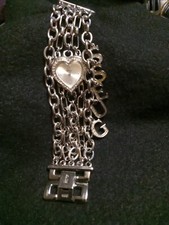 Guess heart shaped Swarovski watch. It has 5 chains and GUESS...