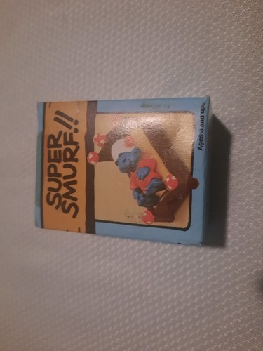 Vintage super puffo sdraiato