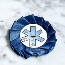 COCCARDA SPILLA TORINO 2006 MASCOTTE ASTER GIOCHI PARALIMPICI INVERNALI GADGET