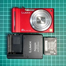 Caricabatteria Panasonic LUMIX DMC ZX1 Leica Lens incluso con adattatore CA