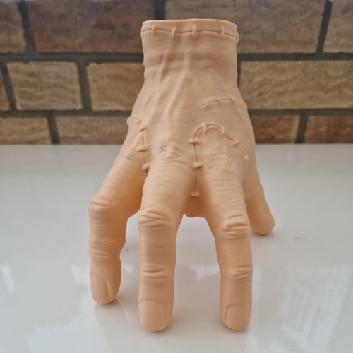 Thing hand from wednesday - thing,