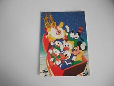 PERSONAGGI DELLA WALT DISNEY CON BABBO NATALE SLITTA