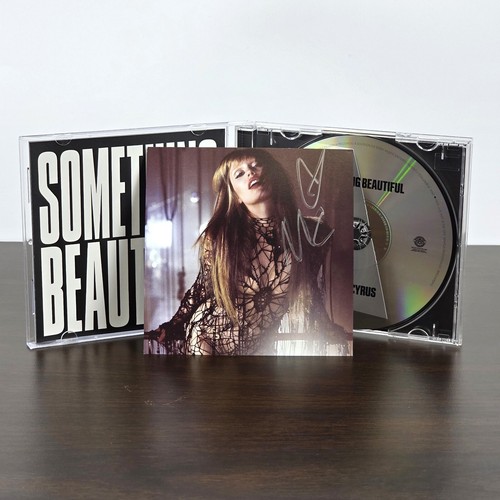 Miley cyrus something - miley,