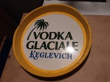 VASSOIO IN LATTA VINTAGE VODKA GLACIALE KEGLEVICH DIAMETRO 33 CM ALTEZZA 4