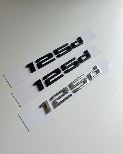 Emblema 125d nero