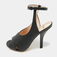 Sandali alla caviglia in pelle