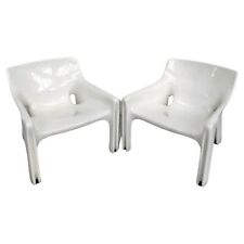 Set of 2 white plastic armchairs “Vicario” model by V. Magistretti for Artemide