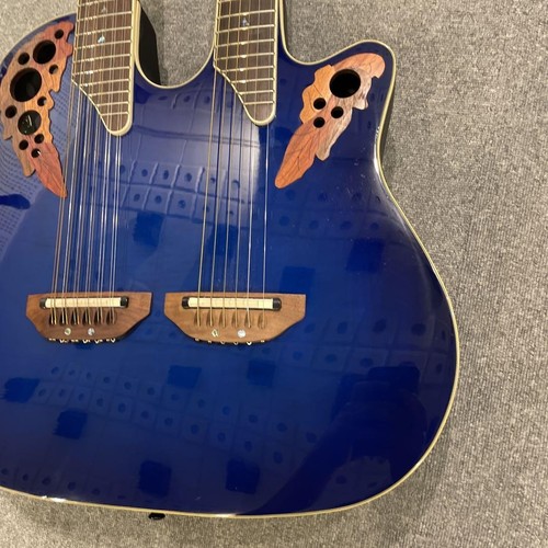 Chitarra elettrica acustica