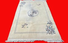 UN VECCHIO TAPPETO ORIENTALE