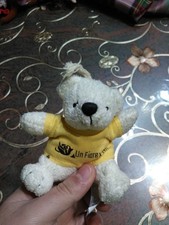 Piccolo peluche d'orsetto "Un Fiore Per Te"