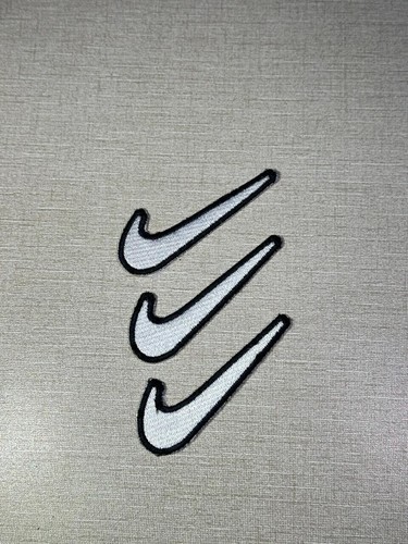 Nike swoosh logo - nike,