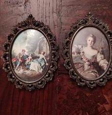 Due quadretti ovali gemelli,vintage,cornice in ferro lavorato,vetro bombato