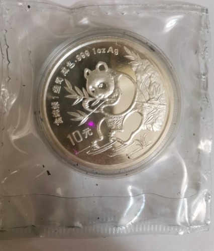 Moneta yuan panda - 10,