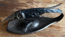 Antico tagliasigari a forma di