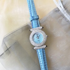 SK ladies blue dial & leather