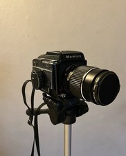 Macchina fotografica analogica Mamiya 645 e obbiettivo Sekor C 150 mm f/4