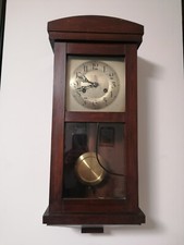 Antico orologio a pendolo