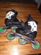 Pattini a rotelle TKO RACING bambini lame in linea regolabili velocità giovani linea rossa 13-3