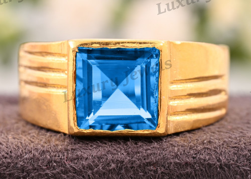 Anello uomo topazio blu