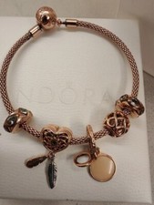 Bracciale Pandora oro rosa con pendenti