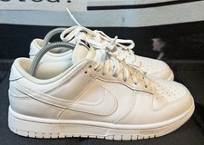 Nike Dunk Low Triple bianche