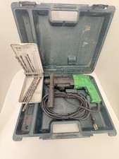 Trapano a percussione rotativo