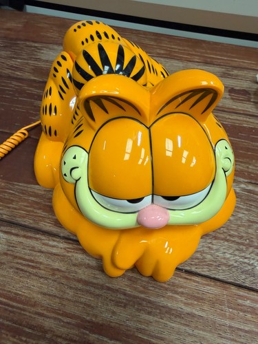 Garfield telephone and coin