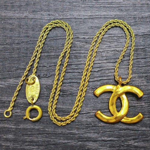 Chanel placcato oro - cc, logos