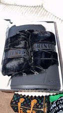 Moon boot icon faux - icon, black